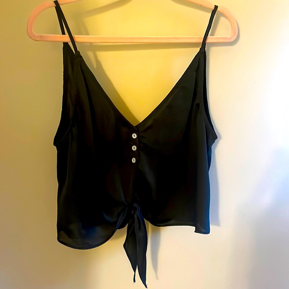 Free People spaghetti strap top with tie at waist.